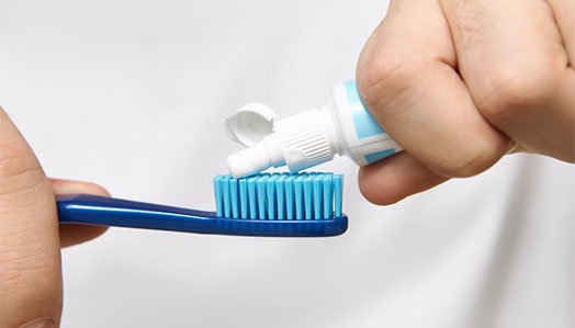 use fluoride-containing toothpaste cheltenham