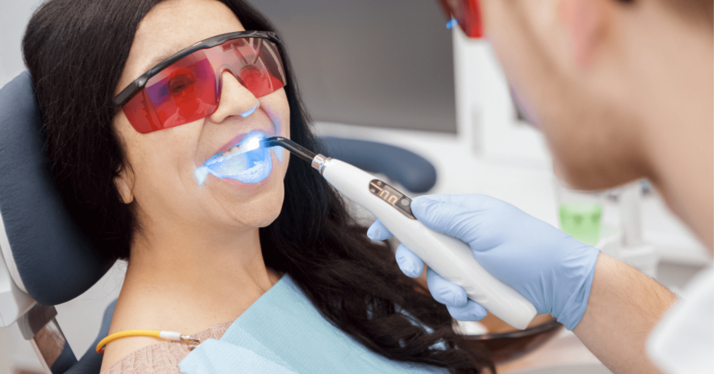 Patient receiving in-chair professional teeth whitening